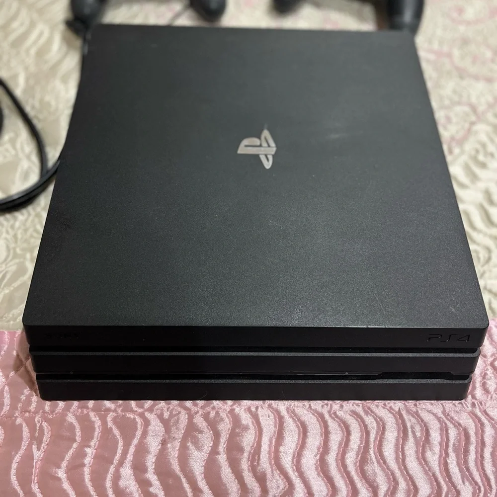Sony PS4 Pro Console with DualShock Controllers - Black